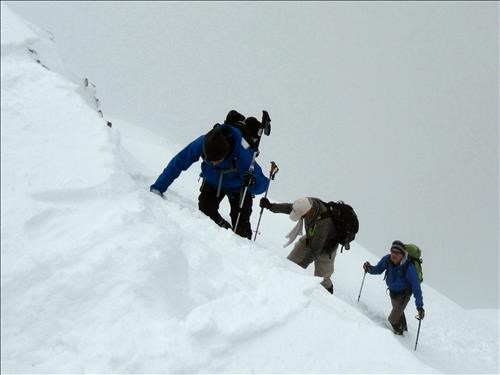 Bruce, Bernie and Clifton exiting on to the upper section of the South ridge