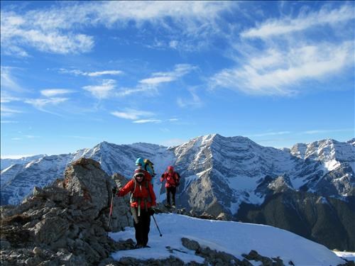 Christine G, Jeanette and Suzy cresting the ridge