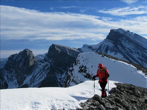 Christine M approaching the summit cairn