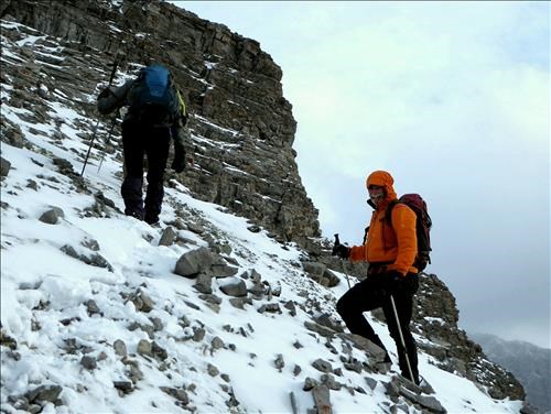 John is all smiles despite the cool temperatures. Clifton leads the way up.