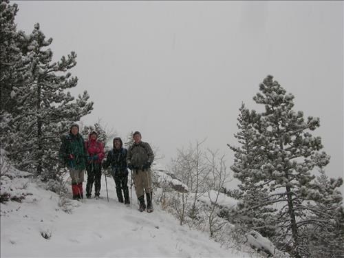 Jim, Teresa, Lenard and Doug on snowy trail