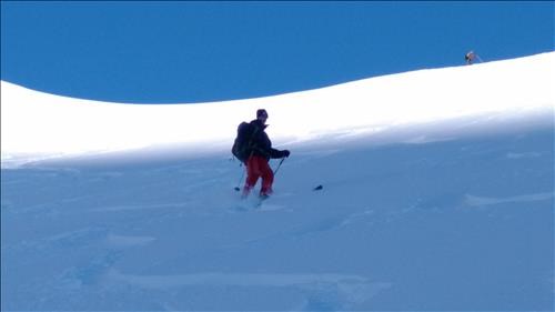 {140 Norman Acquroff} taking a rest on the north headwall. Richard waiting at top