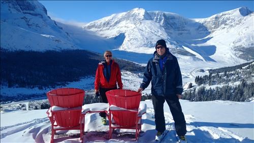 Kim and Dave at the red chairs on the Wilcox Pass trail