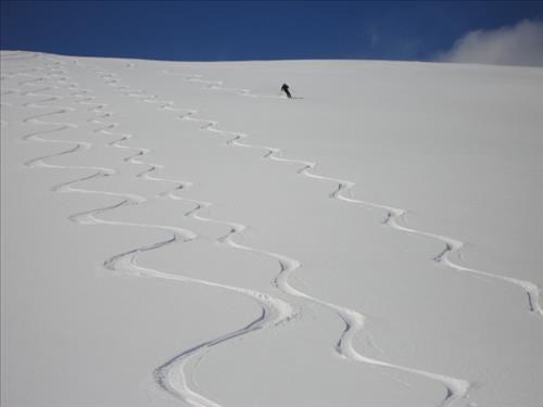 Skiing down Cirque Peak Ridge