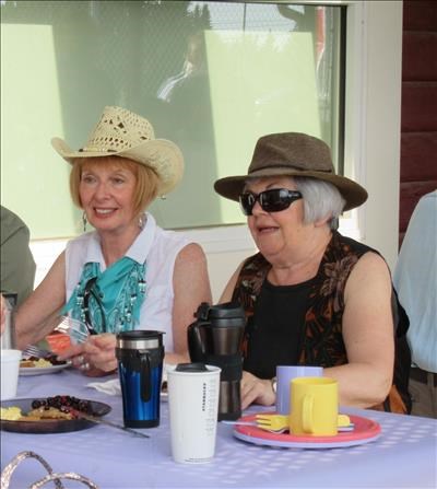 {952 Ginger Brad} and {215 Anita OReilly} at the pancake breakfast
