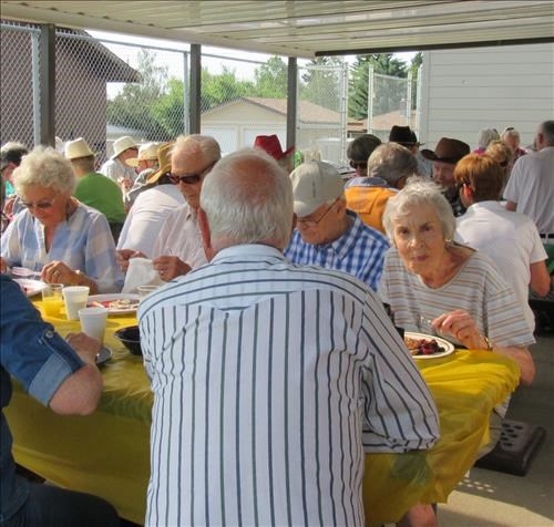 Facing the camera: Four former Ramblers at the pancake breakfast: {310 Dor Tyl}, {254 Ken Watson}, {238 Al Sinc} and {185 Kay Kittle}