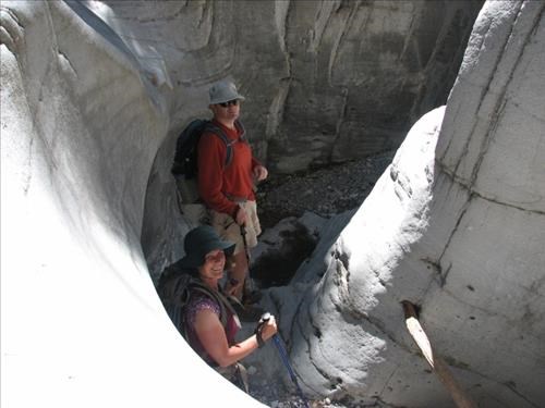 {220 jim pat} and {2008 dor hes} in Nihahi Creek slot canyon