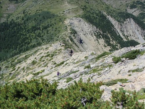 Hiking up from the col, a hot OT5 climb to the northwest summit high point