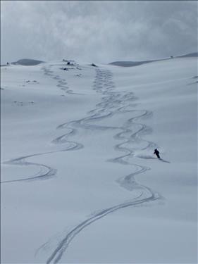 Bill skiing off Unity Peak