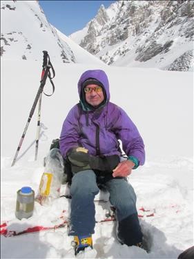 David enjoys lunch after the big climb:French-Haig-Robertson traverse.