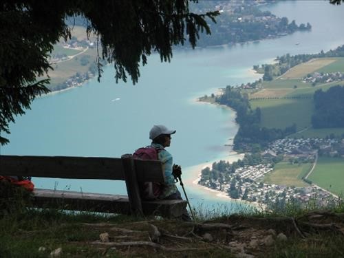 Linda contemplates on a bench with a view