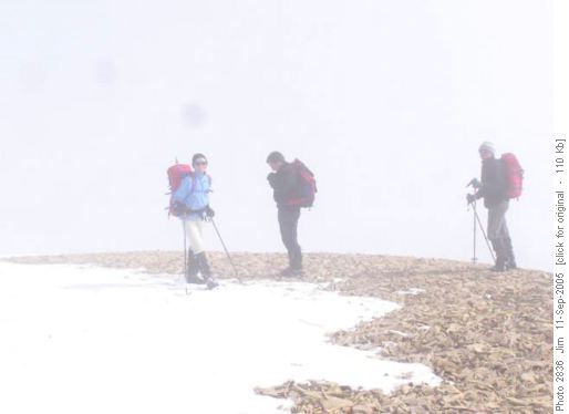 Alda, Jerome and Ricardo on the cloud covered summit of Observation Peak.