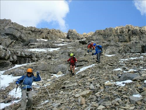Descending the summit block of Mount Noyes