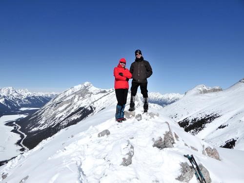 Summit shot under an Alberta blue sky.