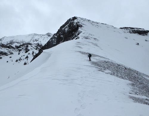 A wind scoured ridge in flat light.