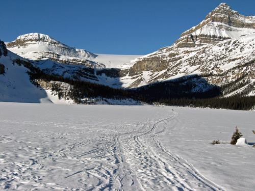 Departing with a cloudless blue sky over the Wapta