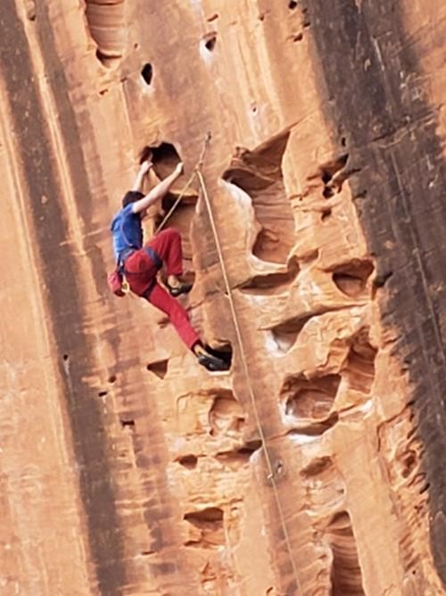 Climbing moves on the wall of the South Fork of Taylor Creek