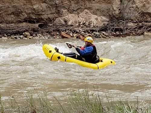 Shooting the rapids of the Virgin River in Zion Canyon