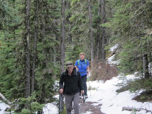 {1456 Clifton Potter} and {1564 Teresa Les} on the trail, muddy from residual snow