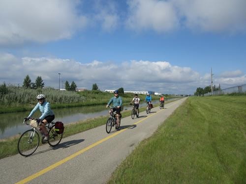 Christine, Jim, Tom, Sarah and Carmie cycling to Ralph Klein Park