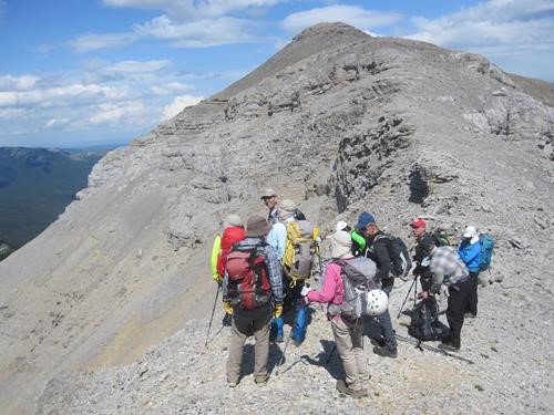 Contemplating the scree bash down (photo courtesy Ulli)