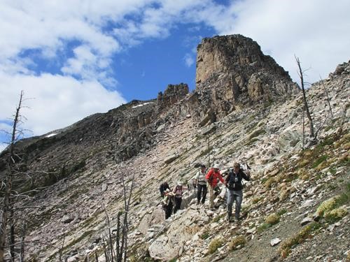 Traversing down to the scree slope at the South end of the ridge