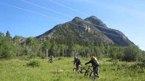 Bikes on powerline with Mary Barclays Mountain in back