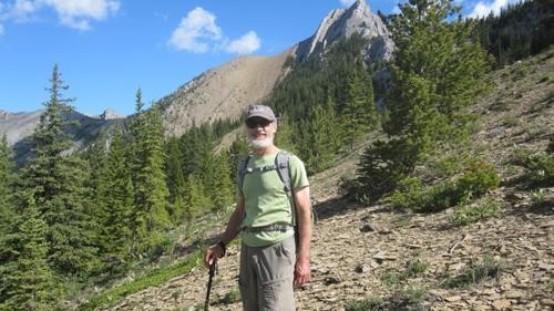 Gary on approach ridge with summit block in background