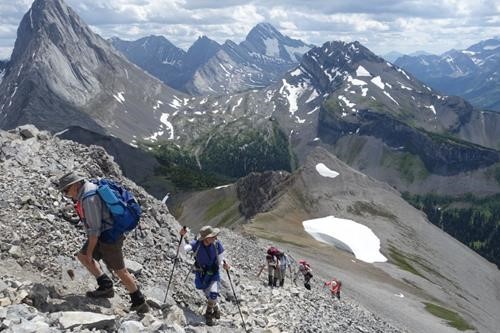 Achieving the summit after the steep final slope