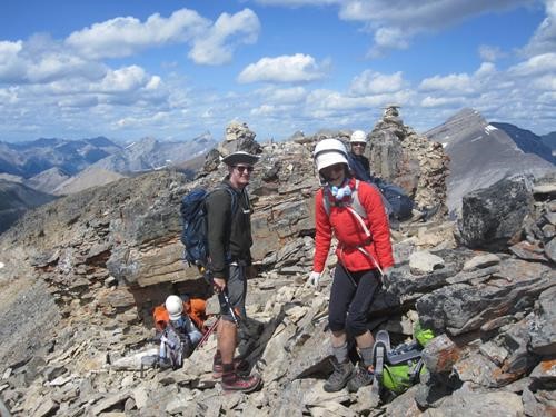 {168 si gal}, {1305 pa mcf}, {2086 t mi} and {1288 b pi} on the windy summit of south Mt. Kidd