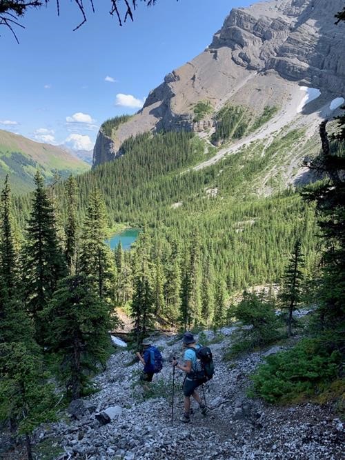 Ron & Anne descending the loose scree trail back to the 1st Memorial Lake