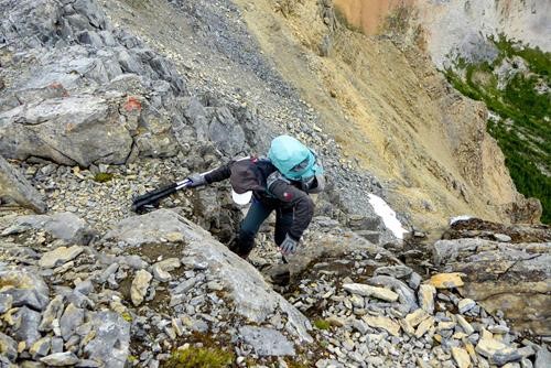 Deb scrambling back up to Paget Peak.