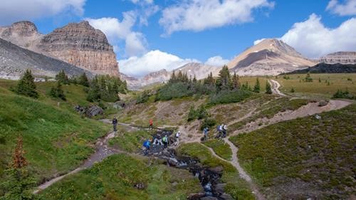 Ramblers crossing the Helen Lake Creek waterfall Ramblers crossing the Helen Lake Creek waterfall