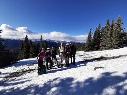 On the way up, blue skies and snowy mountains.