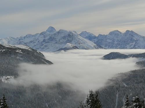 View from our mostly windless lunch spot of a striking high peak left of centre ..... 