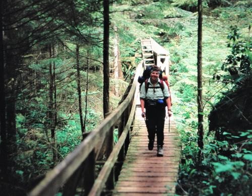 {215 a or} crosses a bridge on the West Coast trail, BC