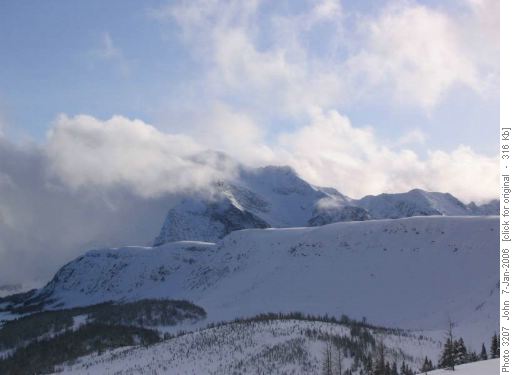 Clouds blowing off Monarch mountain.