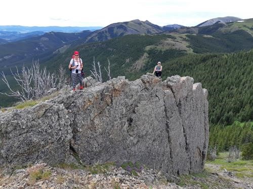 Windy Peak to the right with the tiny snow patch. Cristina and Teresa enjoying some mountaineering.