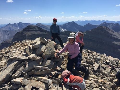 Summit shot looking south; Dogtooth immediately behind, Patterson behind it, and Mount Head far left