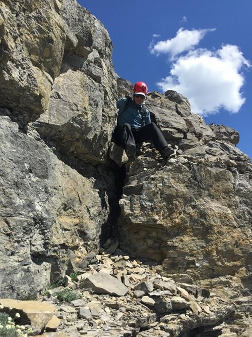 Jack scrambling off Pyriform's summit block