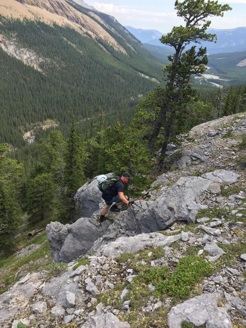 Simon scrambling above bushwhacking section