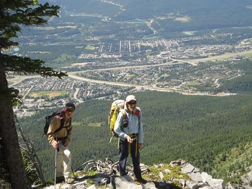Taking a break during the descent of Mt. Grotto. Canmore in the background