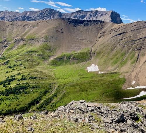 From Highwood Ridge. Scree route down from Grizzly Ridge is in the centre to the right of the cliff bands