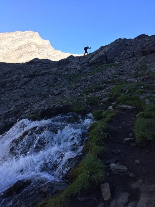 Simon above gushing spring between 1st and 2nd Headwall Lakes