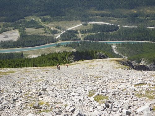 Ramblers descend off Ship's Prow to the cars by the canal 