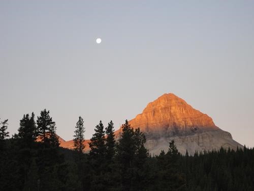Sunrise on Beehive Mountain from trailhead on the Oldman River Road