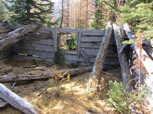 Ulli checks out the ruins of the cabin