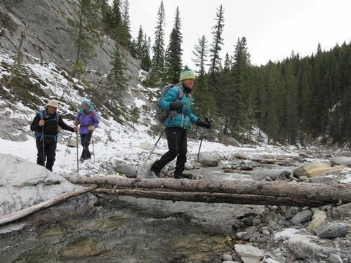 Pam crossing Porcupine Creek at the end of the trip