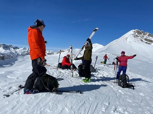 Stripping skins on the ridge for our first run.