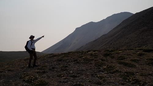 Jim points out Boundary Peak in the distance.